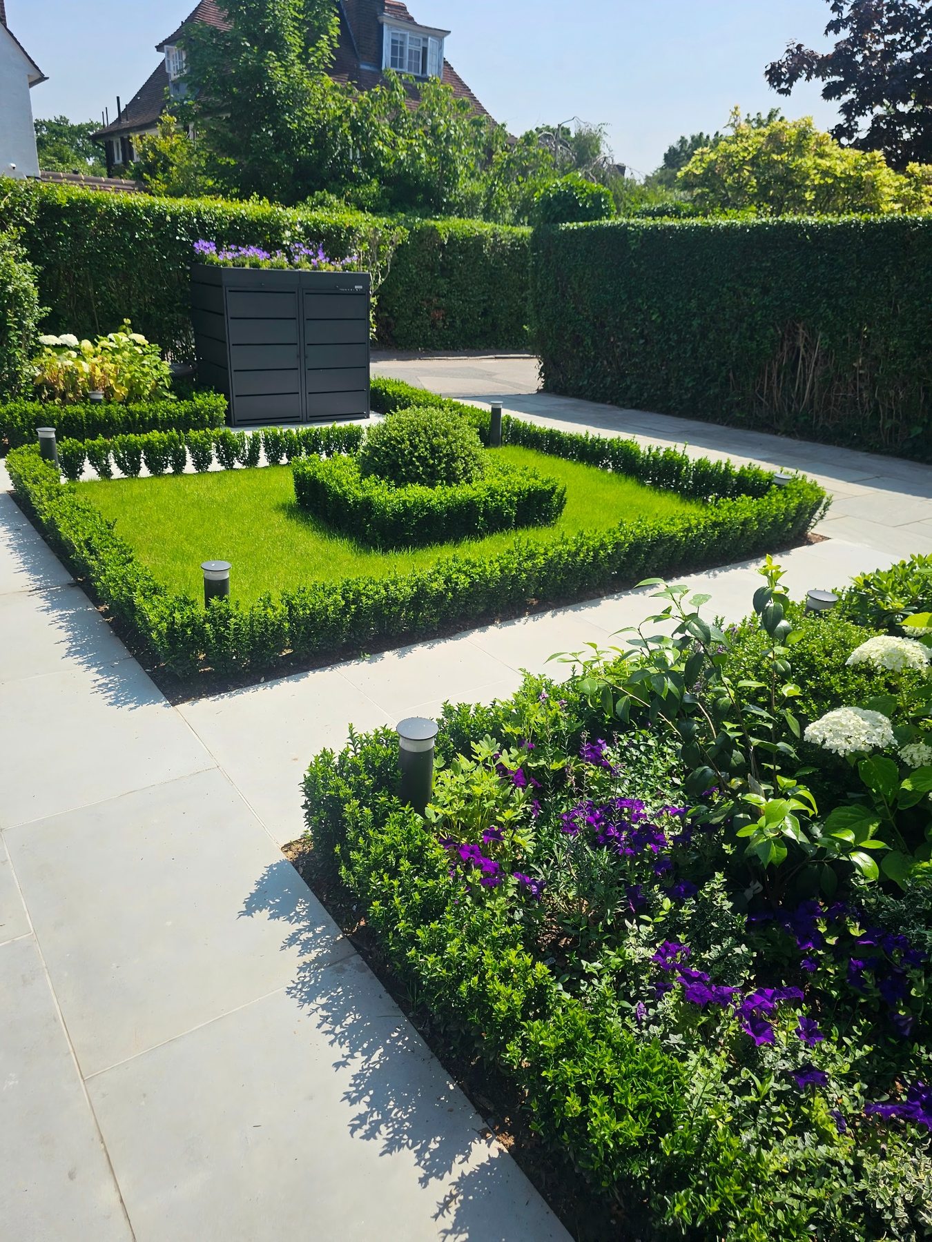 Completed formal garden and paving