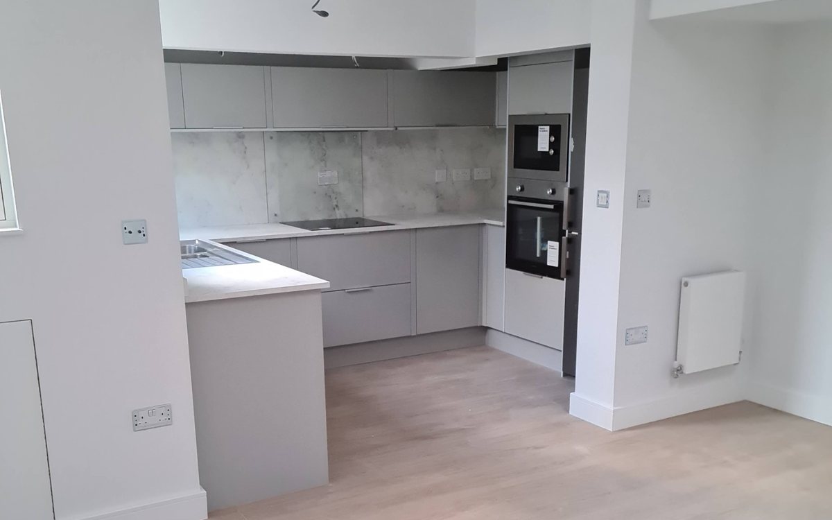 Modern fitted kitchen with quartz worktops